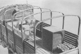 An overhead view of an Army kitchen truck showing the M1937 field ranges and a home-made ice chest